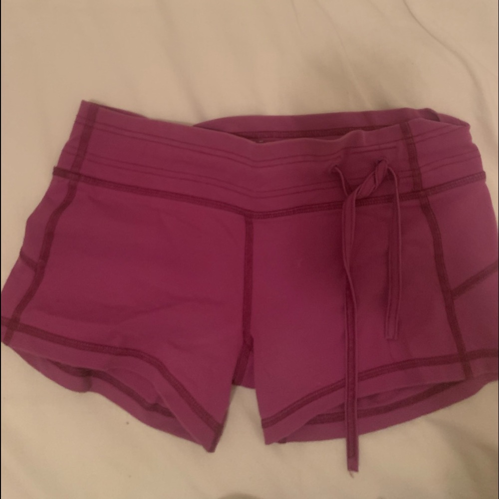 Magenta yoga shorts by tonic